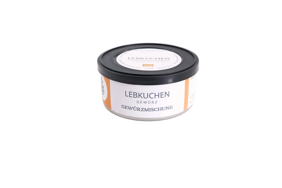 Lebkuchen-Gewürz von Jungermann Gourmet in einer orangefarbenen 40-g-Dose mit schwarzem Deckel, vor freigestelltem Hintergrund.