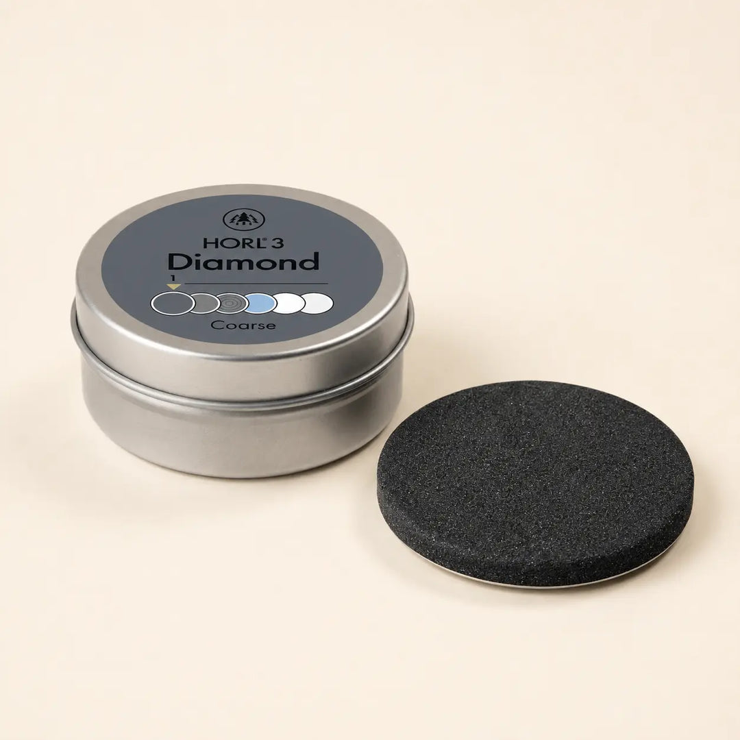 HORL3 Diamant Grob Schleifscheibe mit Originaldose als Produktmotiv