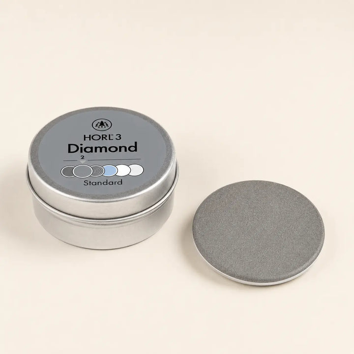 HORL3 Diamant Standard Schleifscheibe mit Originaldose als Produktmotiv