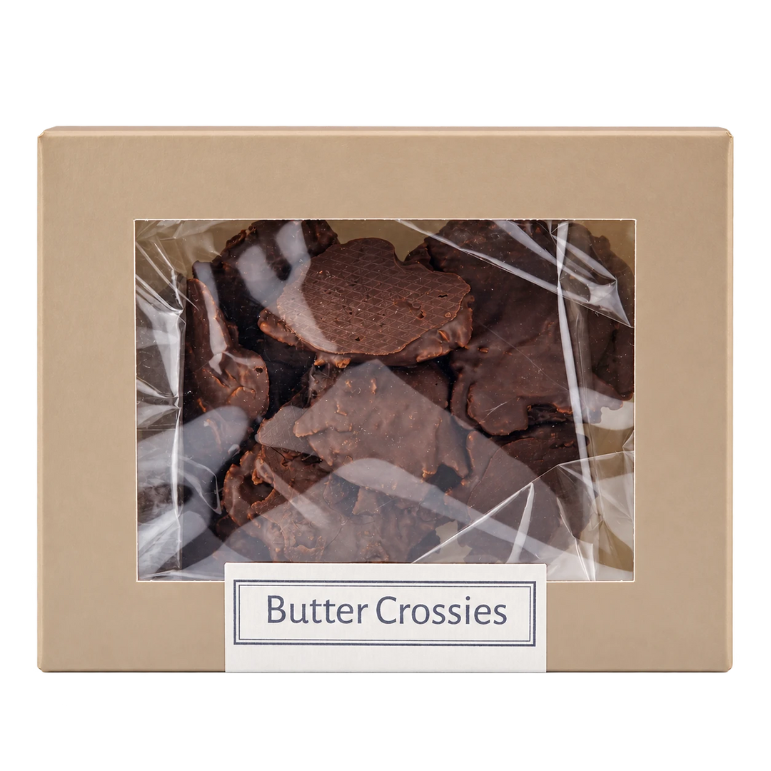 Butter-Crossies von Jungermann Gourmet in der Gebäckschachtel mit Sichtfenster – freigestellte Frontalansicht.