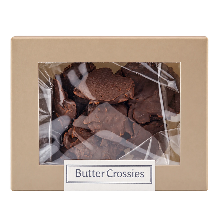 Butter-Crossies von Jungermann Gourmet in der Gebäckschachtel mit Sichtfenster – freigestellte Frontalansicht.