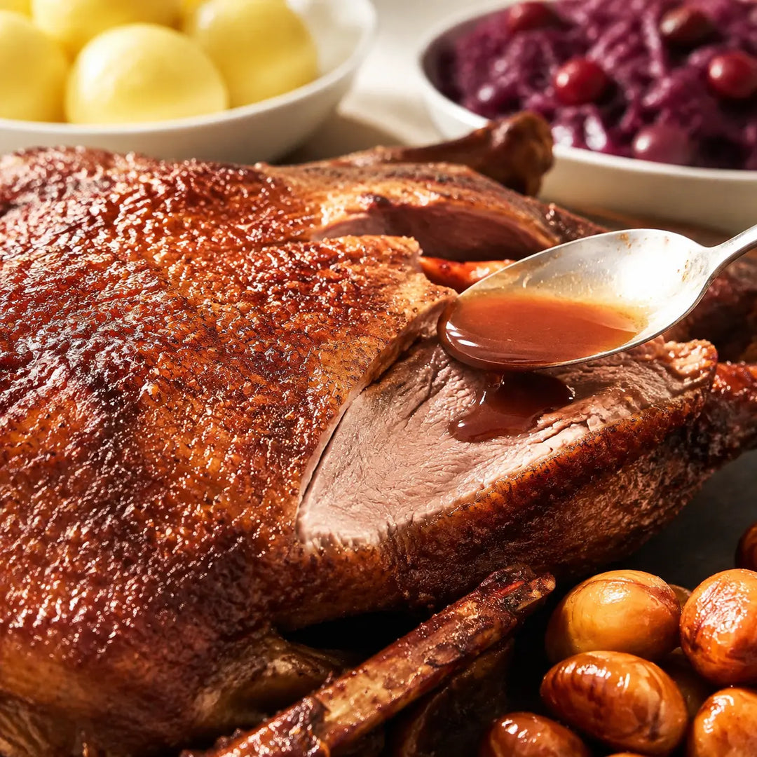Knusprige Gans to go für den Versand – saftiges Fleisch im Detail