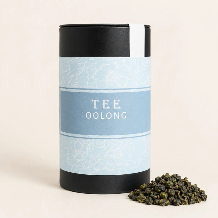 Jade Oolong Tee von Jungermann Gourmet in hellblauer Dose mit gerollten Blättern