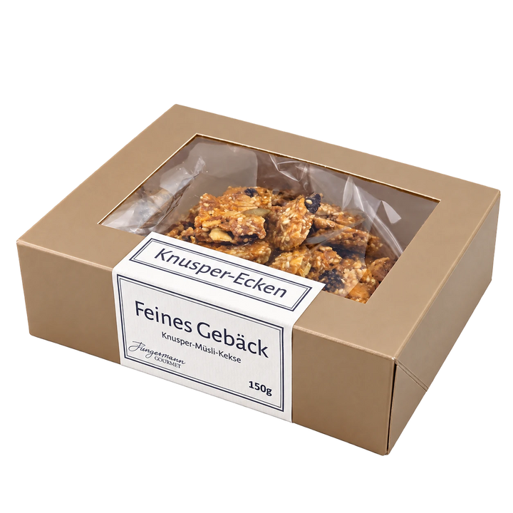 Knusper-Ecken von Jungermann Gourmet in der Gebäckschachtel mit Sichtfenster – freigestellte Produktansicht.