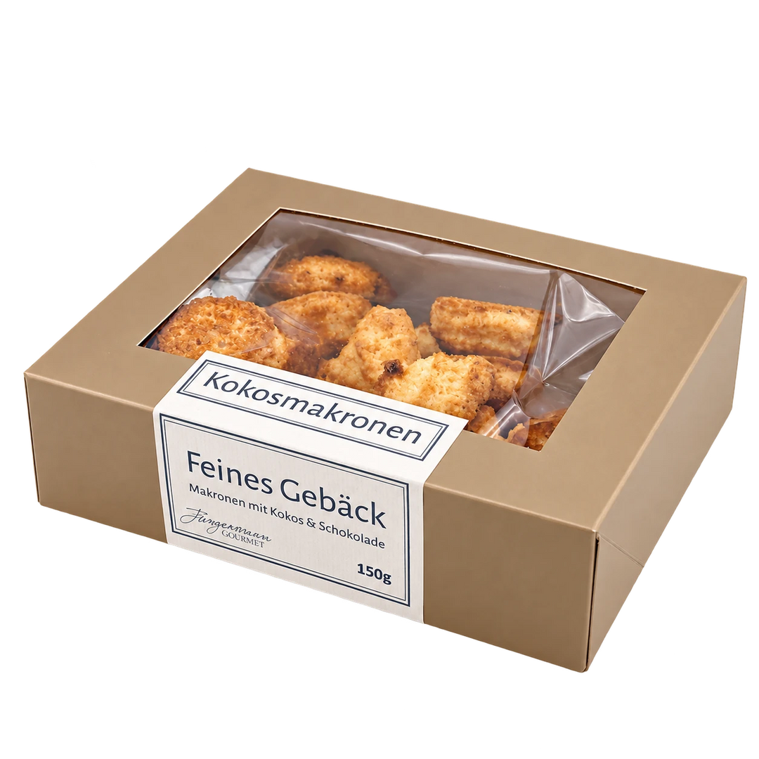 Kokosmakronen von Jungermann Gourmet in der Gebäckschachtel mit Sichtfenster – freigestellte Produktansicht.