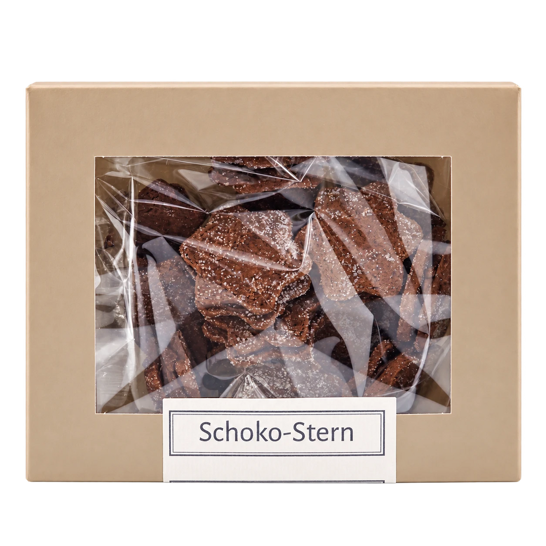 Schoko-Sterne von Jungermann Gourmet in der Gebäckschachtel mit Sichtfenster – freigestellte Frontalansicht.