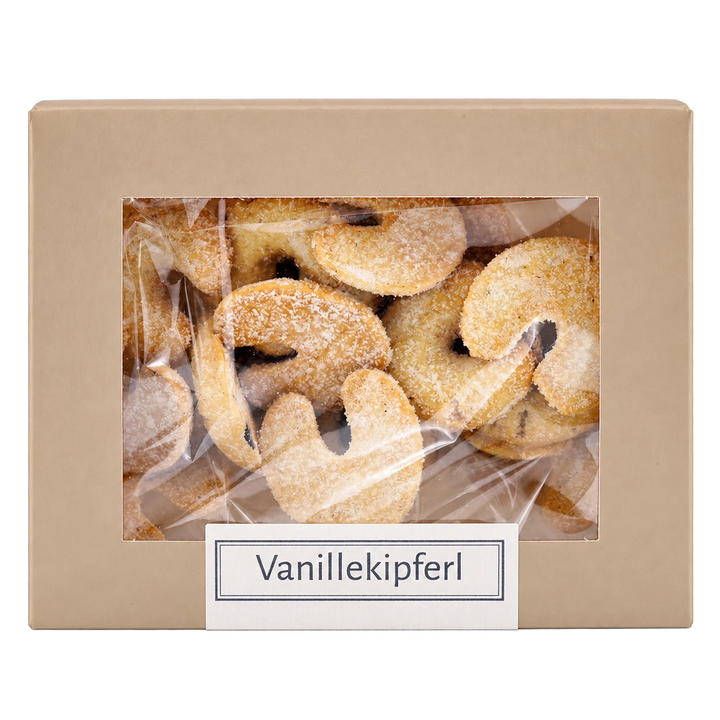 Vanillekipferl von Jungermann Gourmet in der Gebäckschachtel mit Sichtfenster – freigestellte Frontalansicht.