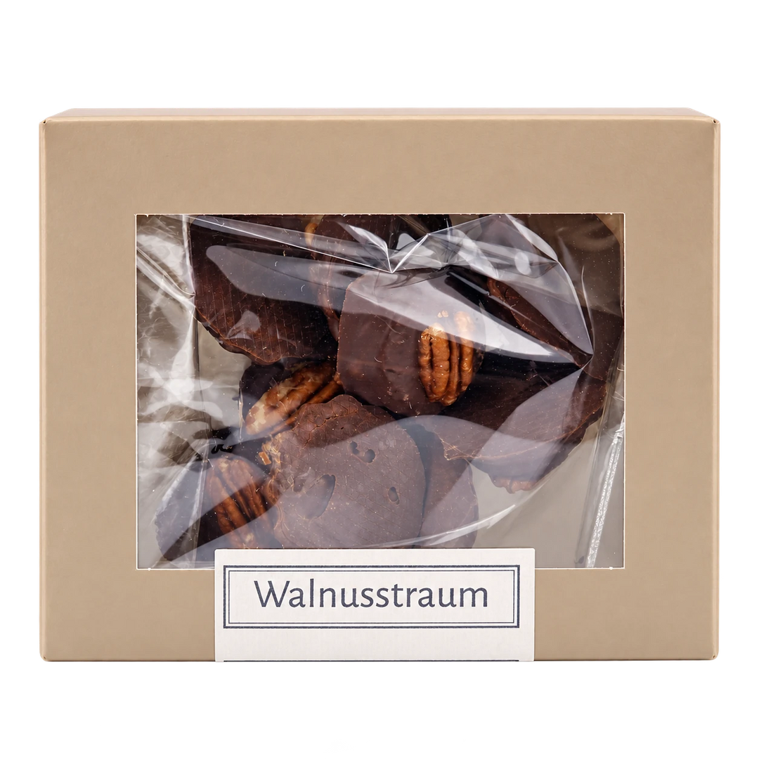 Walnusstraum von Jungermann Gourmet in der Gebäckschachtel mit Sichtfenster – freigestellte Frontalansicht.