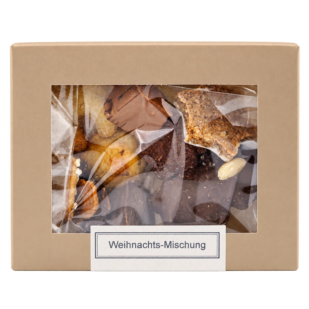 Weihnachts-Mischung von Jungermann Gourmet in der Gebäckschachtel mit Sichtfenster – freigestellte Frontalansicht.