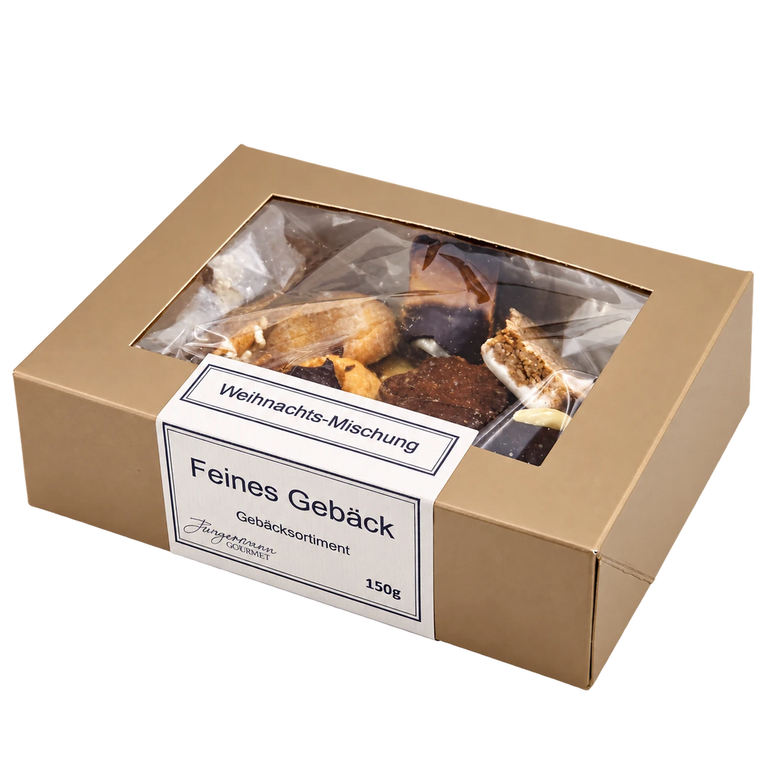 Weihnachts-Mischung von Jungermann Gourmet in der Gebäckschachtel mit Sichtfenster – freigestellte Produktansicht.