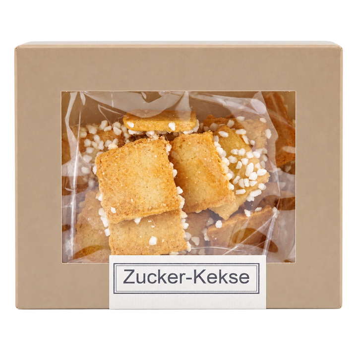 Zucker-Kekse von Jungermann Gourmet in der Gebäckschachtel mit Sichtfenster – freigestellte Frontalansicht.